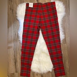 Zara pants red plaid color with zipper pockets. Stretch material. Size Large